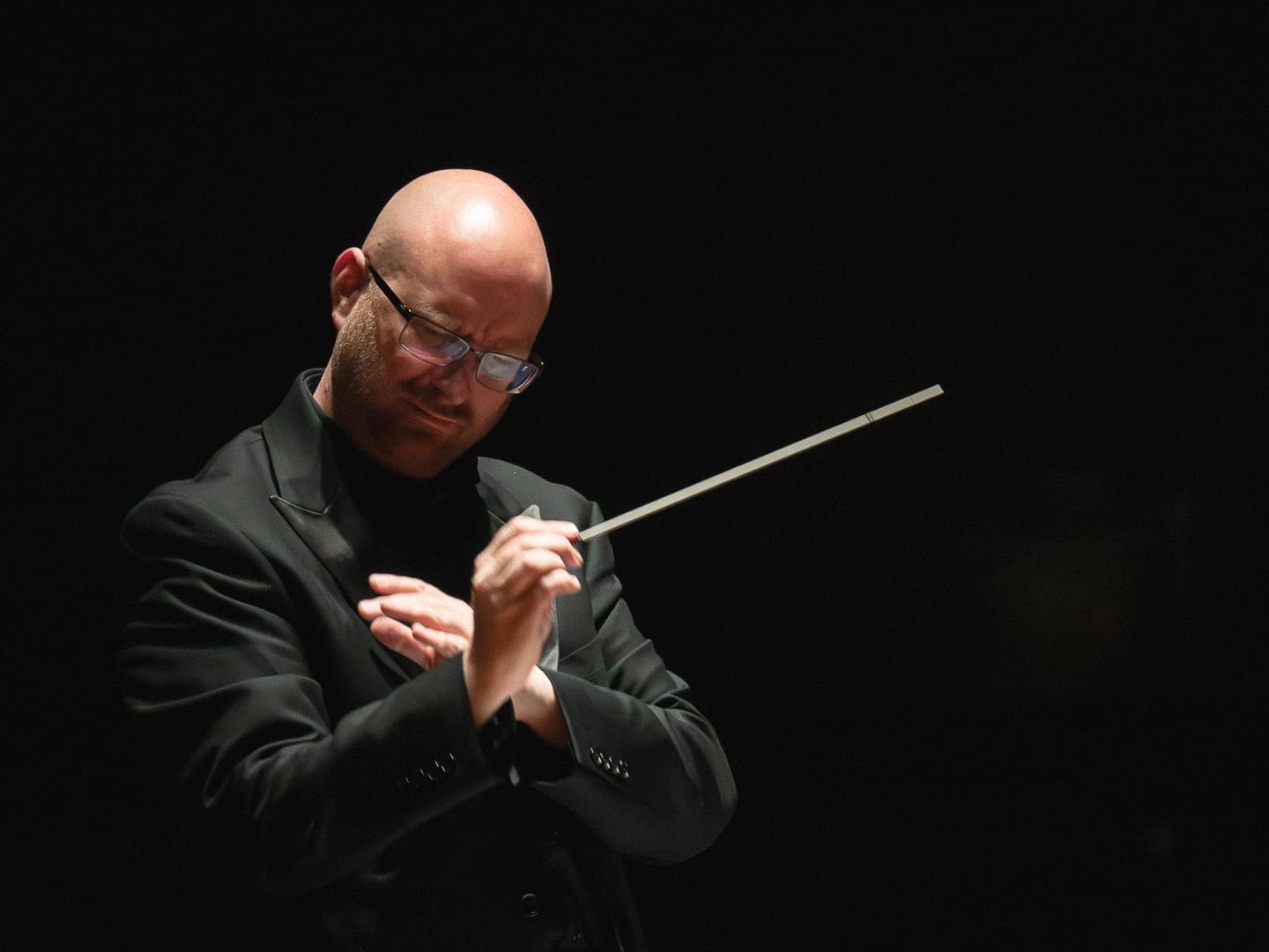 Conductor with baton